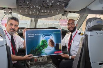 Two KQ pilots holding a certificate