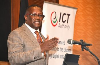 Photo of CS Owalo speaking at Konza