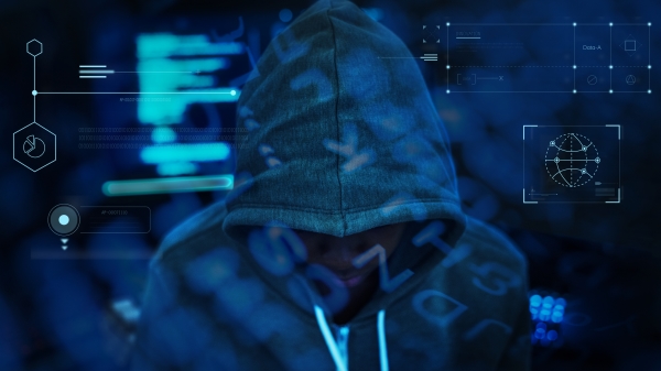 A cyber security criminal in darkness