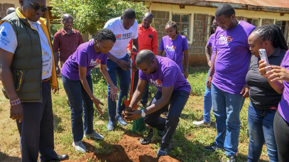 FedEx and Feed the Children staff during the launch
